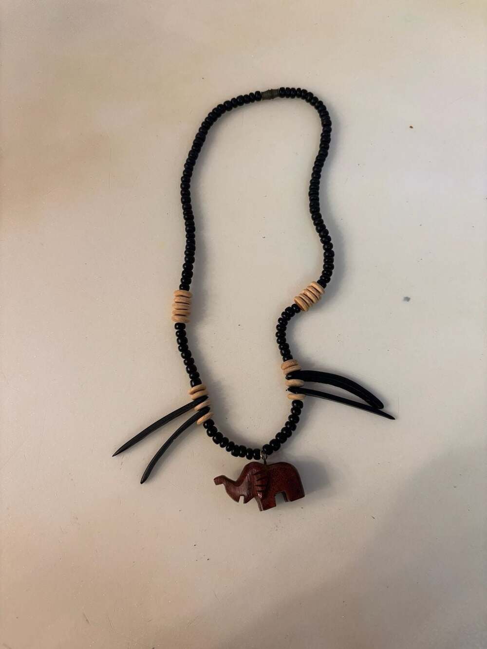 Vintage African Safari Wood Bead Necklace with Carved Elephant Pendant and Spike